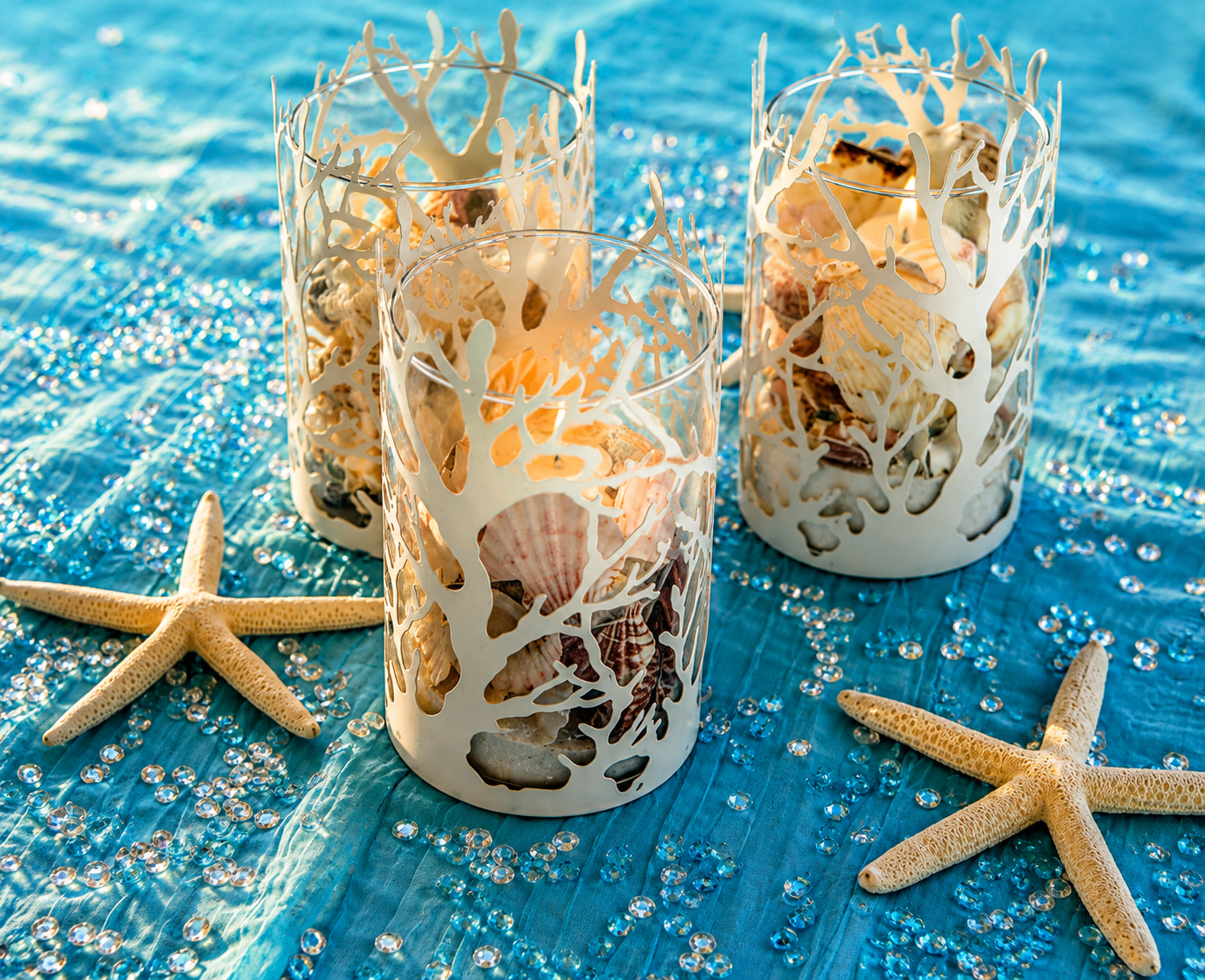 Coastal candle and starfish wedding decor
