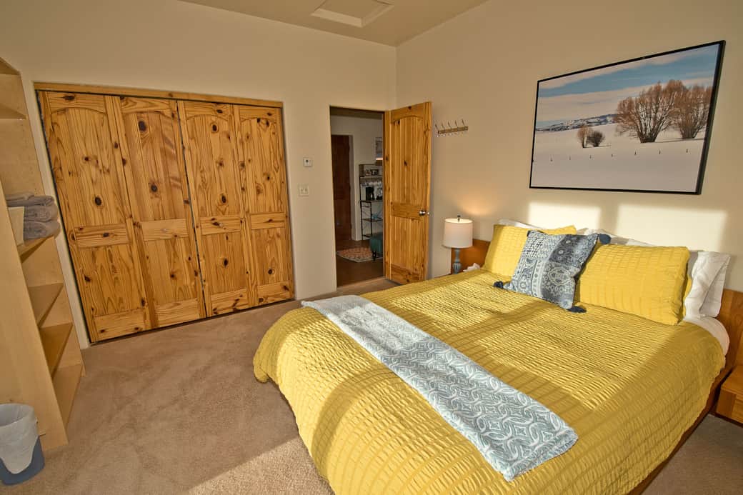 Studio Building: Bedroom with Patio and Valley Views