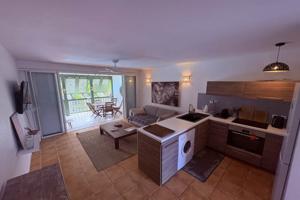 Kitchen open to the living room and fully equipped Maison de Marie