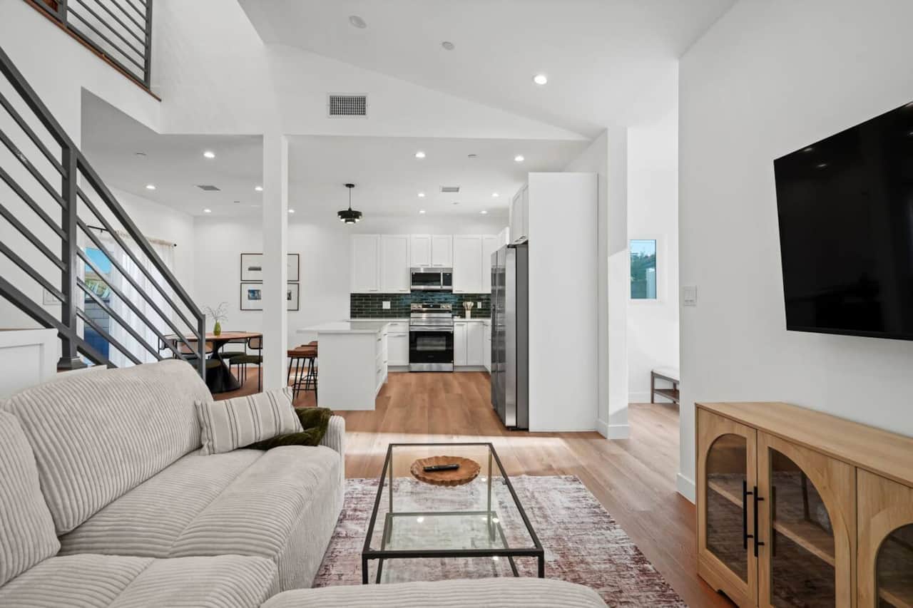 Featuring an open space layout that flows into the kitchen and dining area for easy gathering.