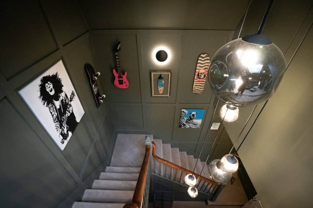 The apartment has a bohemian music inspired private hallway. 