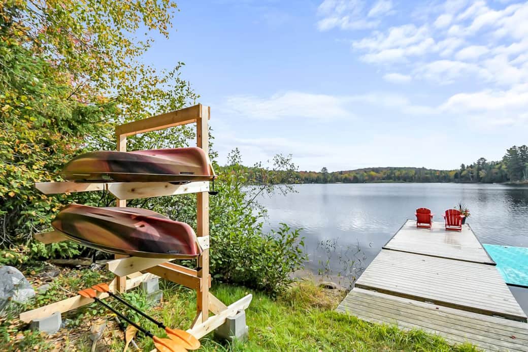 Lovely waterfront with docks, boats, floating mat - and all the paddles and life jackets.