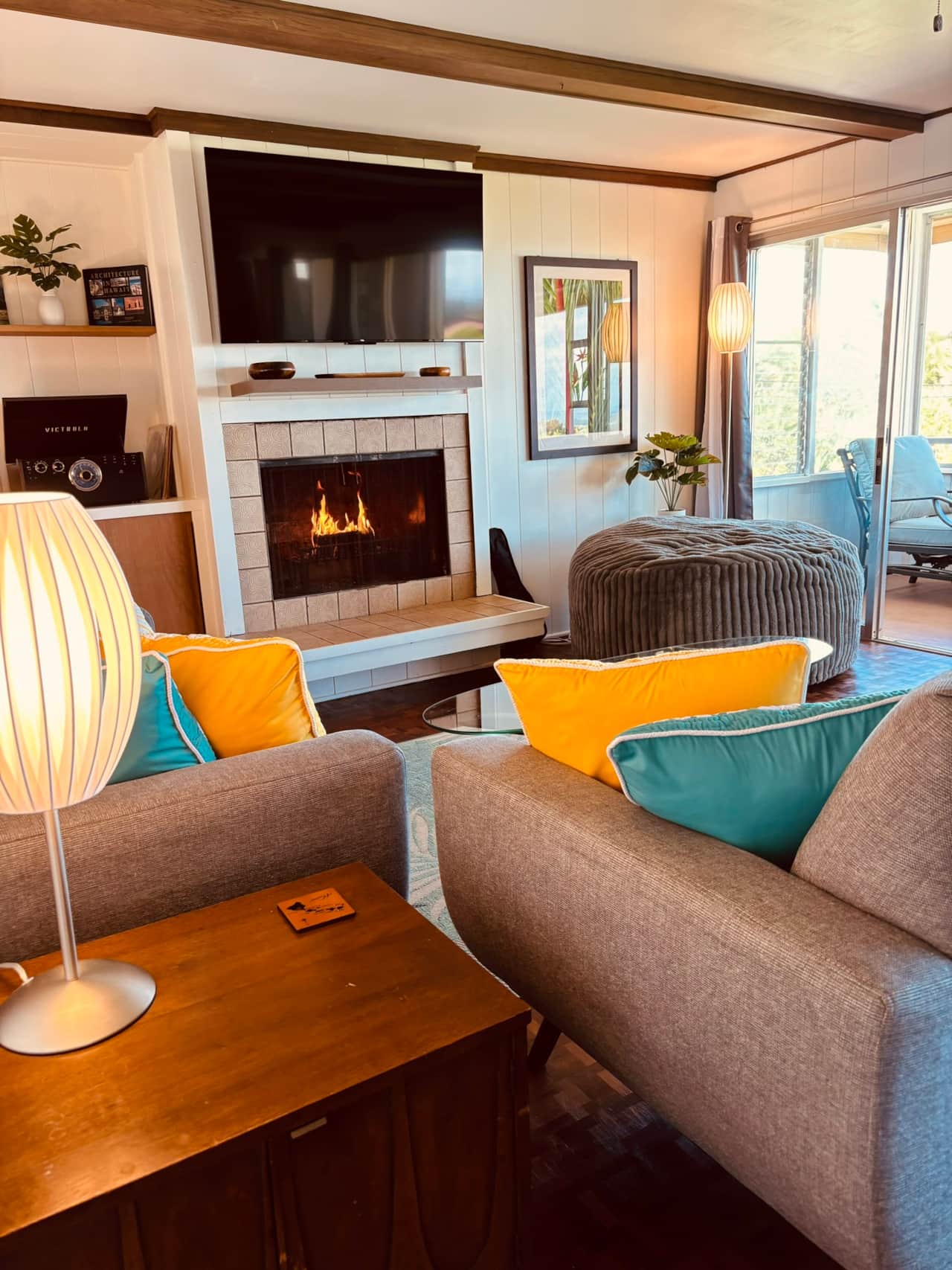 Lounge in the living room with a wood fire