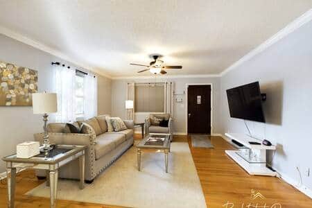 Living Room equipped with 55" Smart TV, Firestick, Base Cable, and all the creature comforts