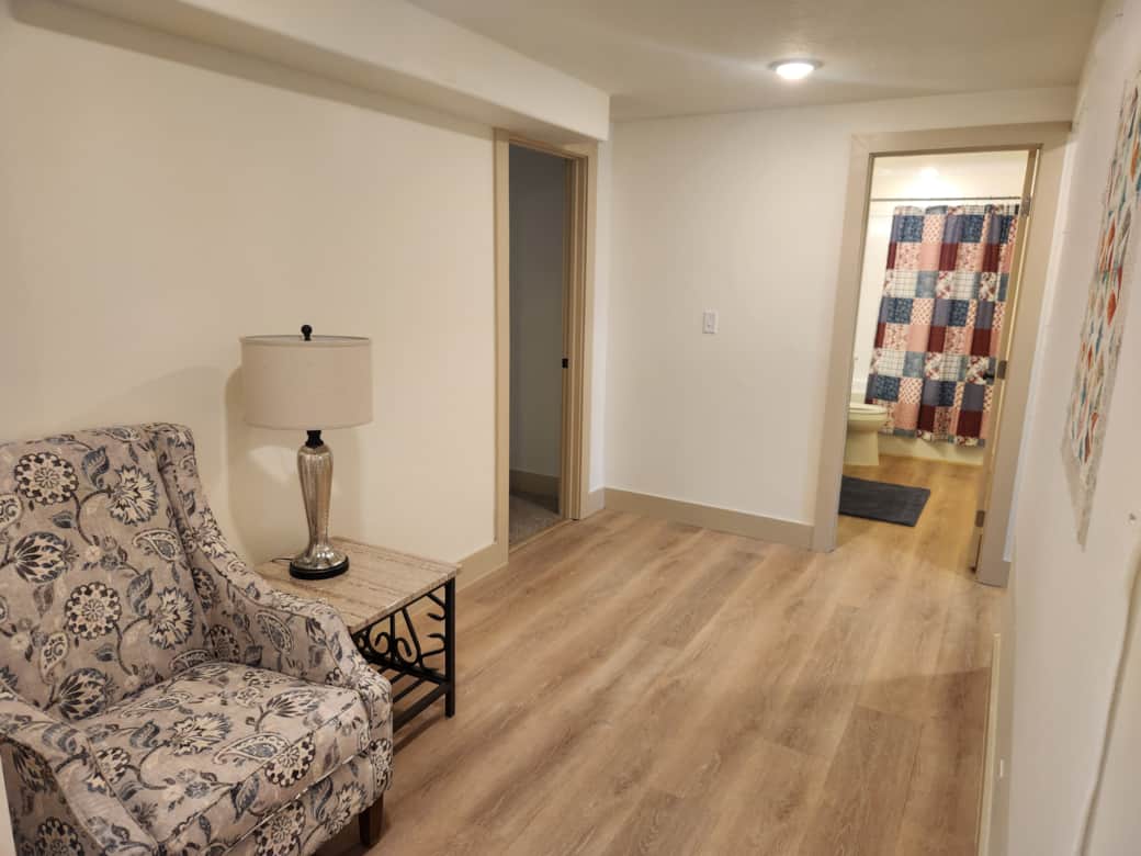 Design Wall: A large design wall makes planning easy, with a comfortable chair for taking it all in.