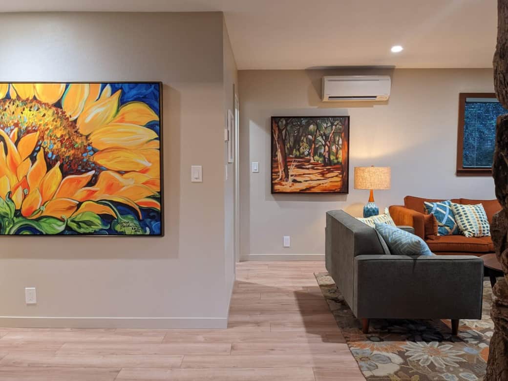 Side view of TV Room/Den and hallway. Home is air conditioned throughout and each room is individually controllable.