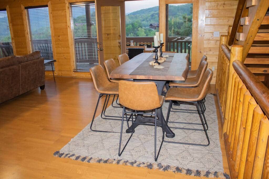 Dining room larg enough for 8 people to sit with additional seating outside and in the living room