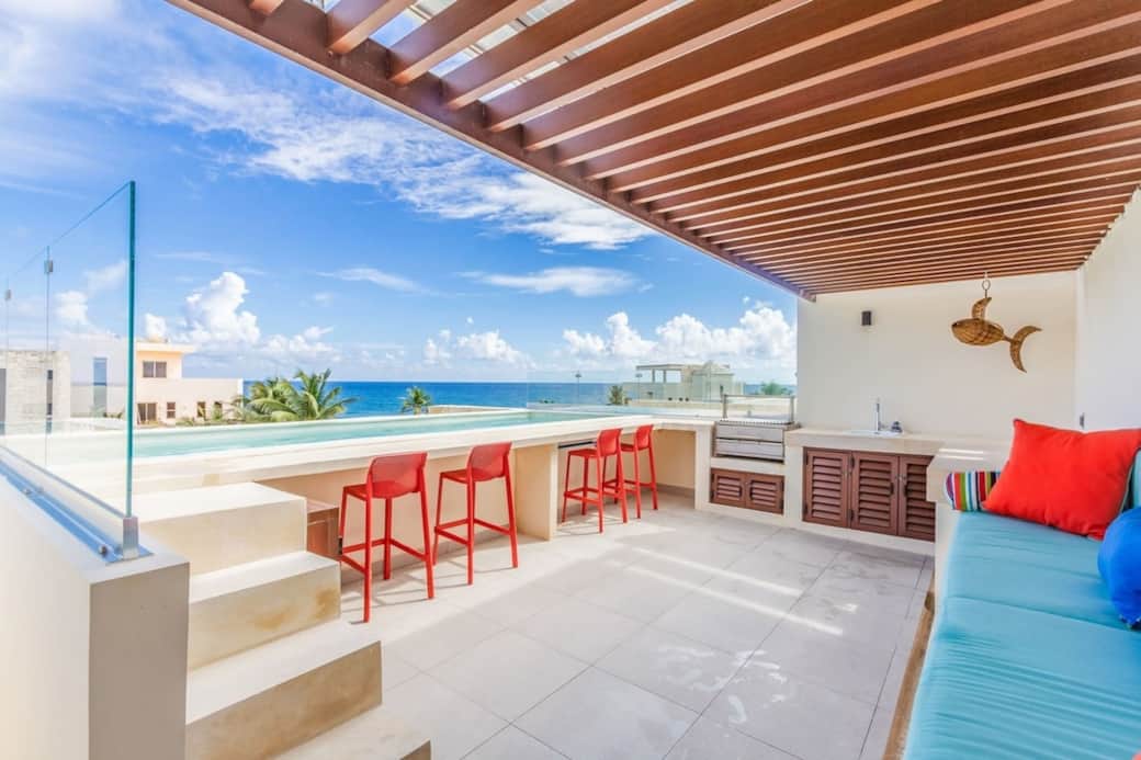 Enjoy a private rooftop terrace with pool, BBQ, and breathtaking ocean views.
