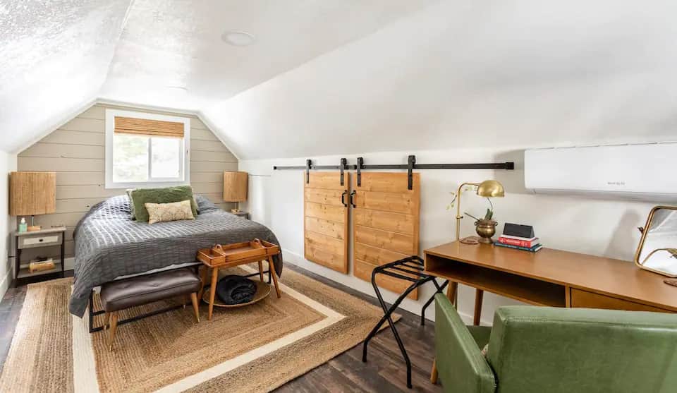 Upstairs master bedroom with closet, built-in dresser drawers, and a dedicated workspace Upstairs master bedroom with closet, built-in dresser drawers, and a dedicated workspace