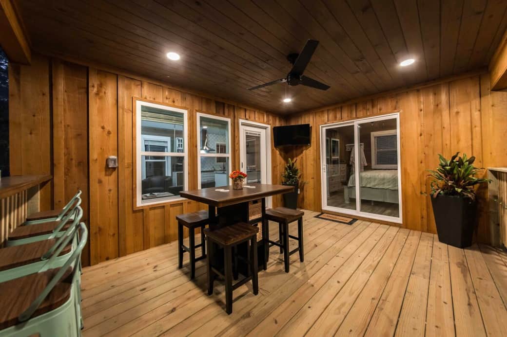 Front porch dining and television. Front porch dining and television.