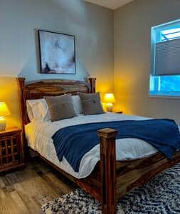 Second bedroom, queen bed, located downstairs.