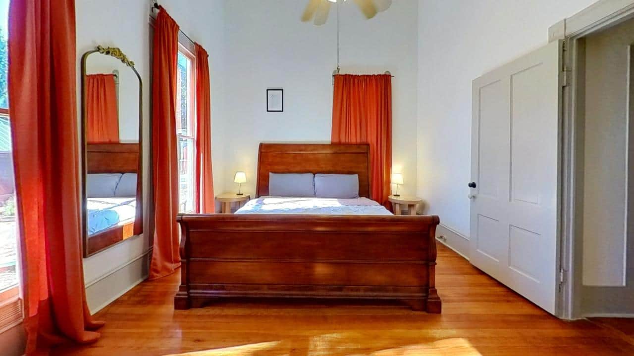 Tranquil bedroom at The Wildflower House, where historic charm meets cozy comfort