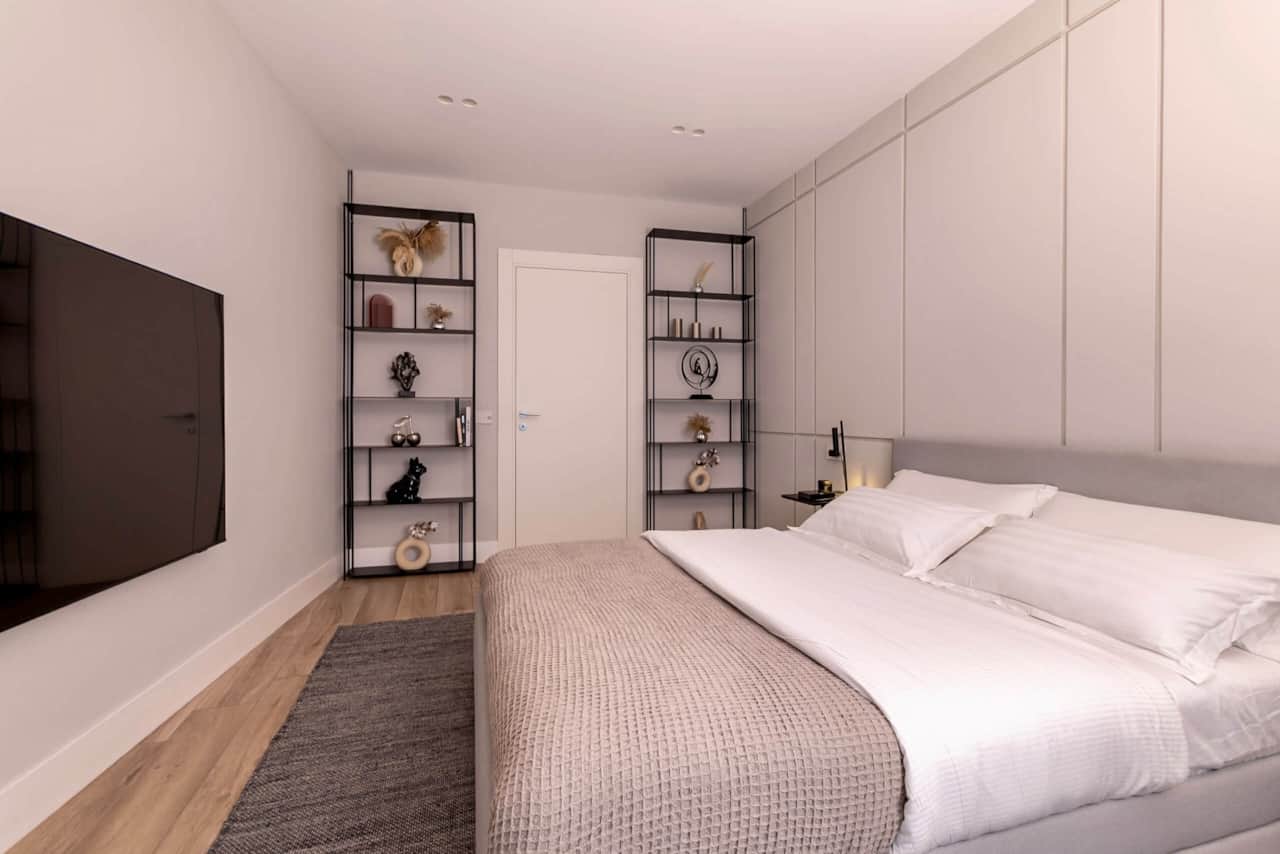 Bedroom with premium linens professionally cleaned by our in-house laundry service