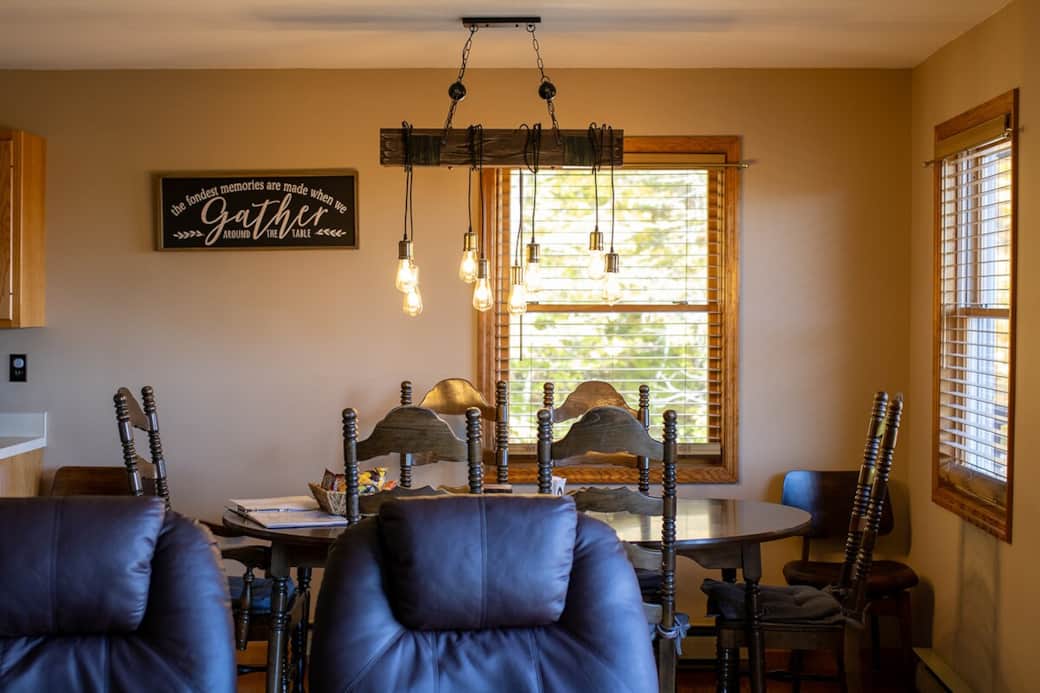Dining Area: Gather around the stylish table under chic pendant lights and create lasting memories!