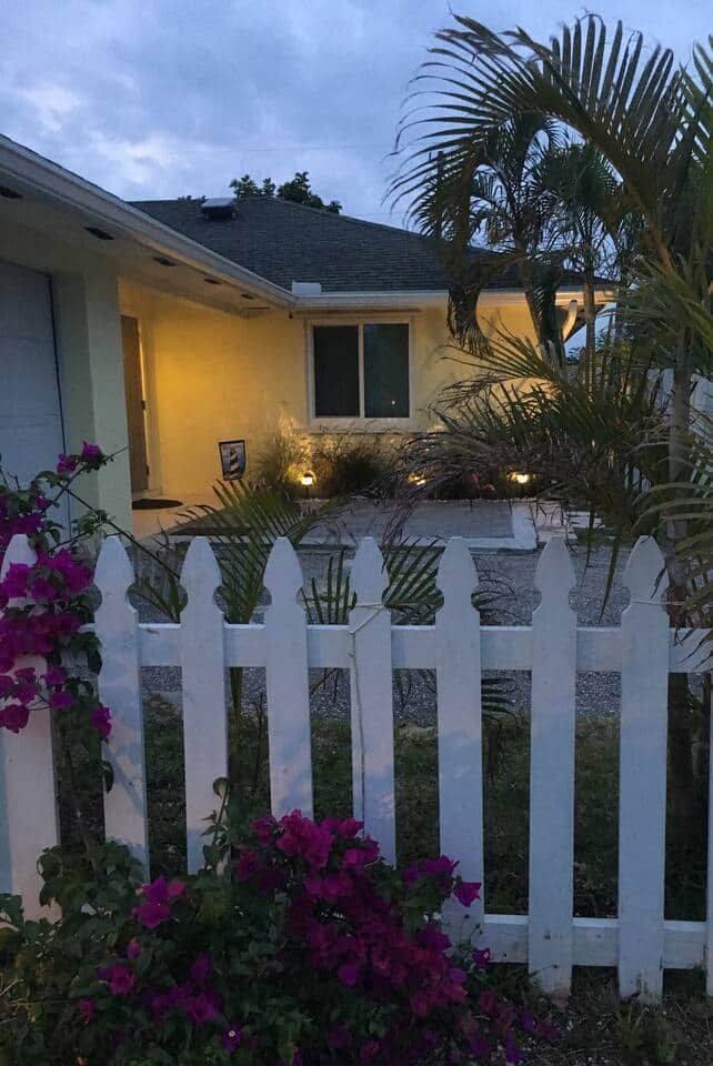 The well lit front entry provides a welcoming atmosphere at night while also keeping safety in mind. Exterior security cameras are in use for the safety of the property and our guests.