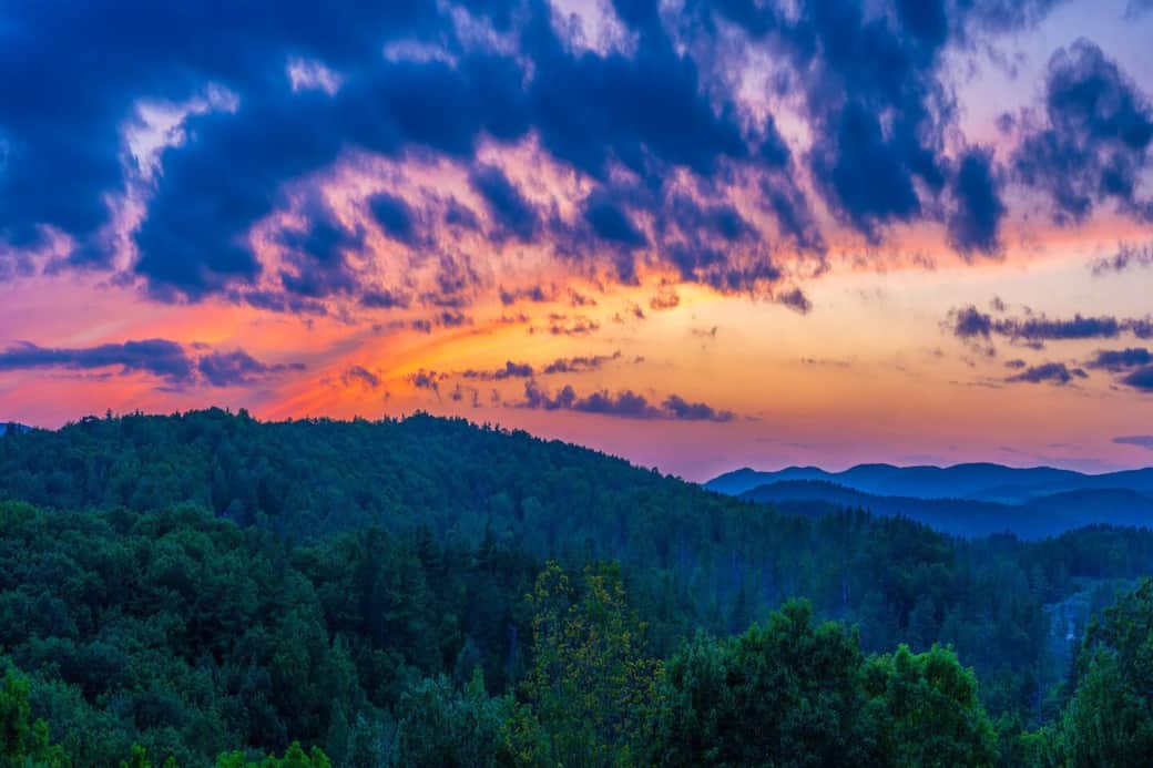  Watch the mountains glow at sunset.