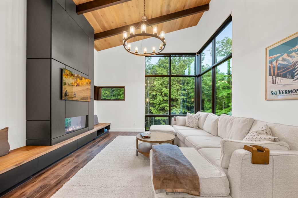 Natural and indoor light combine to create a bright, airy living room space.