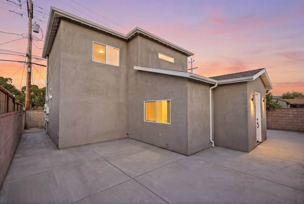 Exterior features a private driveway for parking.