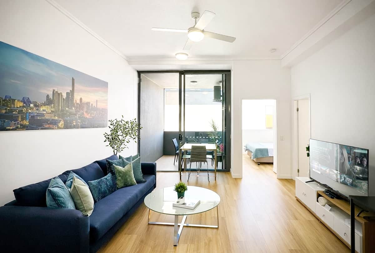 Clean and spacious living space opening to the alfresco balcony.