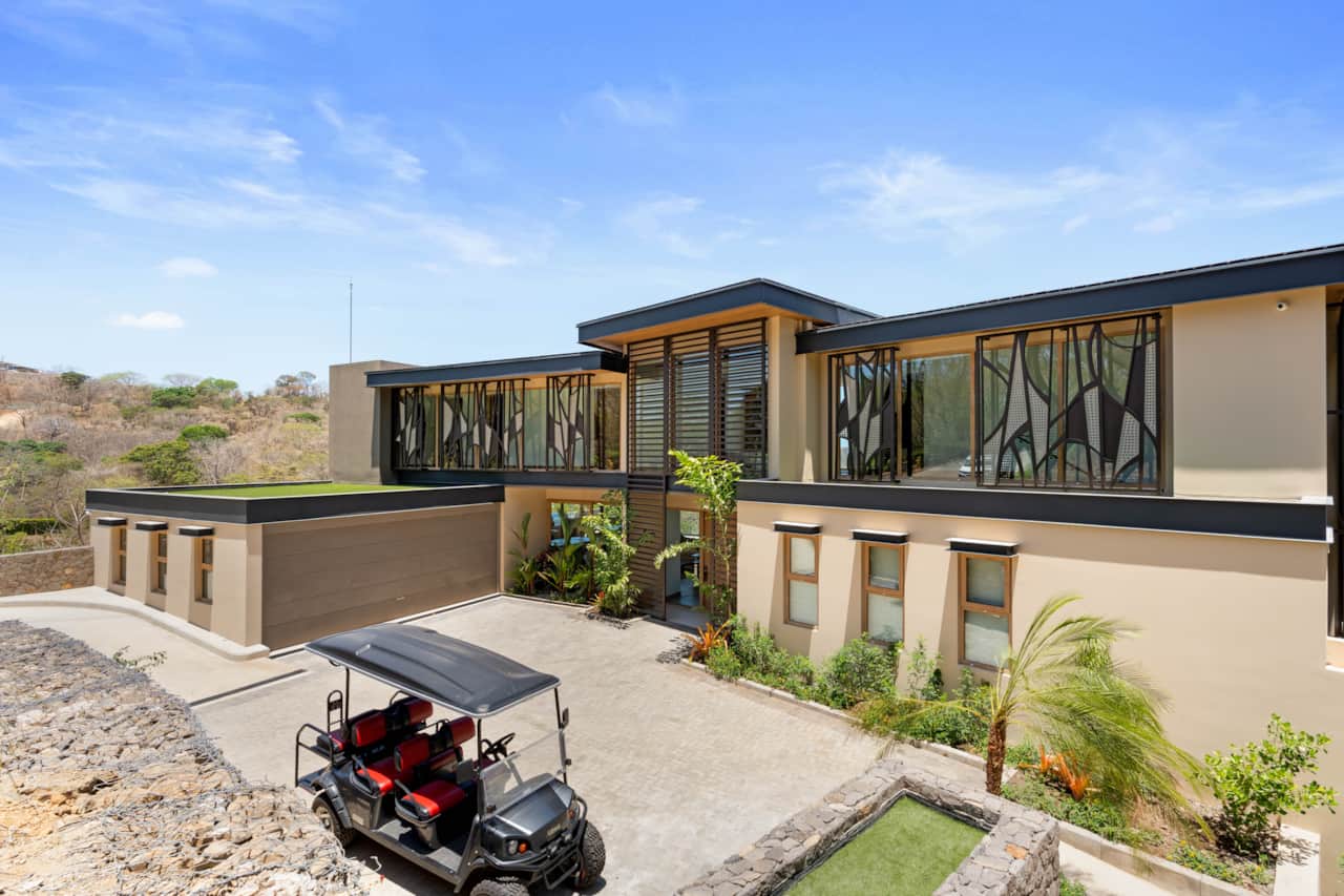 Villa Zaya's modern architecture above Reserva Conchal