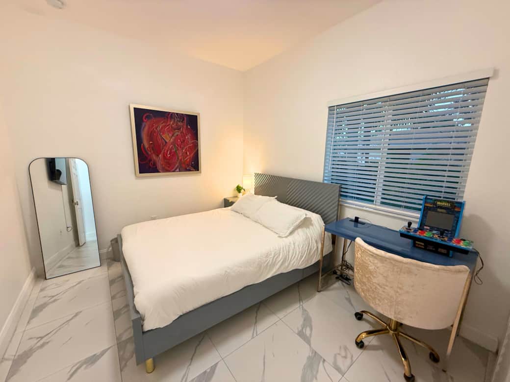 Cozy second bedroom with queen bed, cotton sheets, and a welcoming, modern design