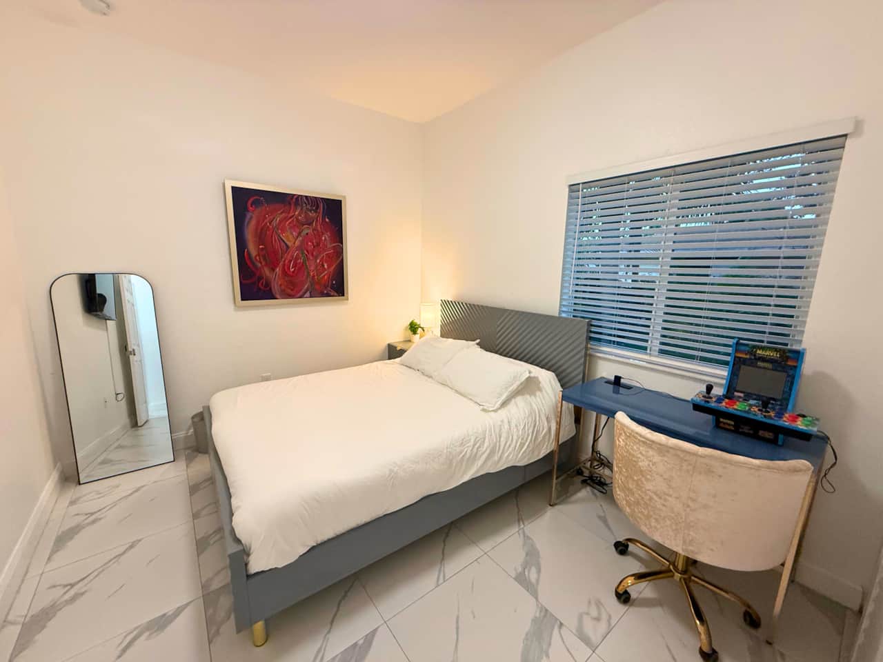 Cozy second bedroom with queen bed, cotton sheets, and a welcoming, modern design