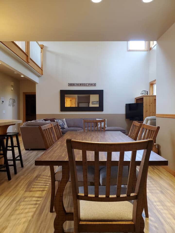 Dining room to living room open concept feel.