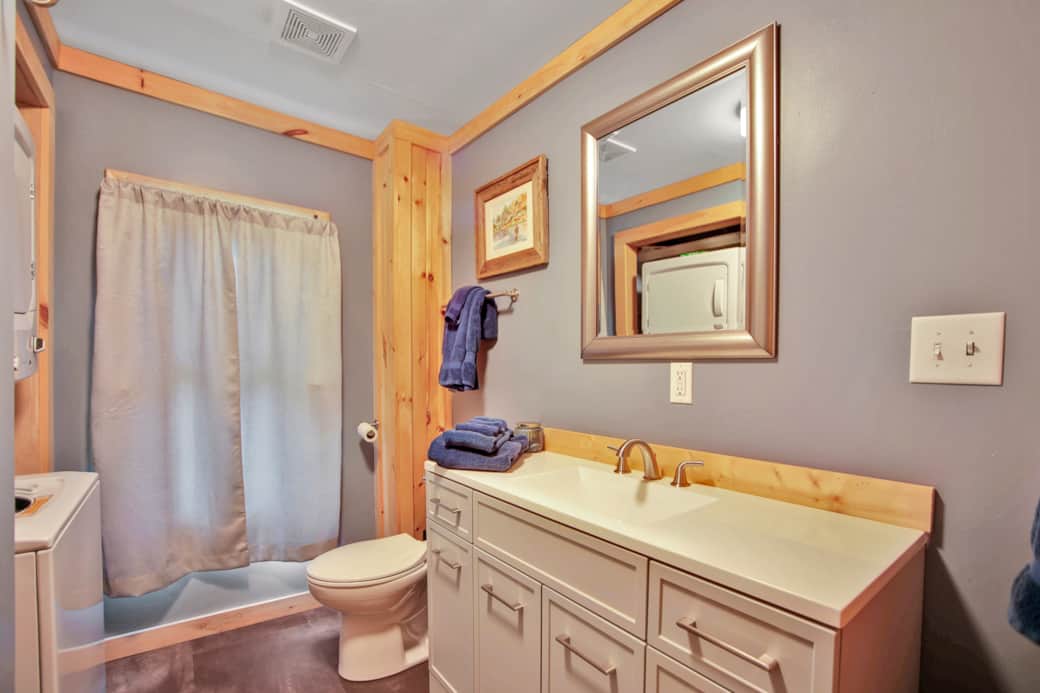 First Level Bathroom, tub/shower combo with washer and dryer