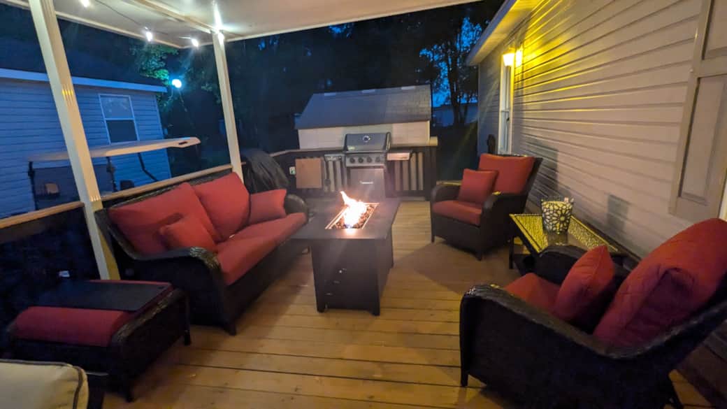 Covered deck, with lounge area and fire table Covered deck, with lounge area and fire table
