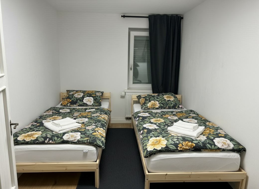 Schlafzimmer mit zwei Einzelbetten Schlafzimmer mit zwei Einzelbetten