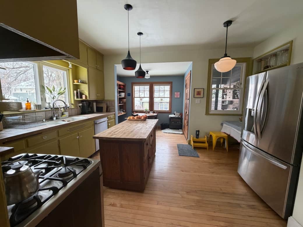 Spacious, fully equipped kitchen overlooking the garden—ideal for cooking and casual meals.