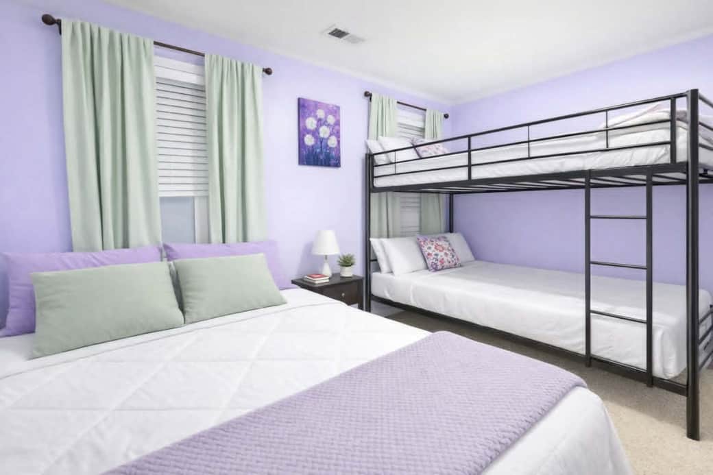 Designed for families and groups, this cozy bedroom features a queen bed and twin-over-full bunk bed Designed for families and groups, this cozy bedroom features a queen bed and twin-over-full bunk bed