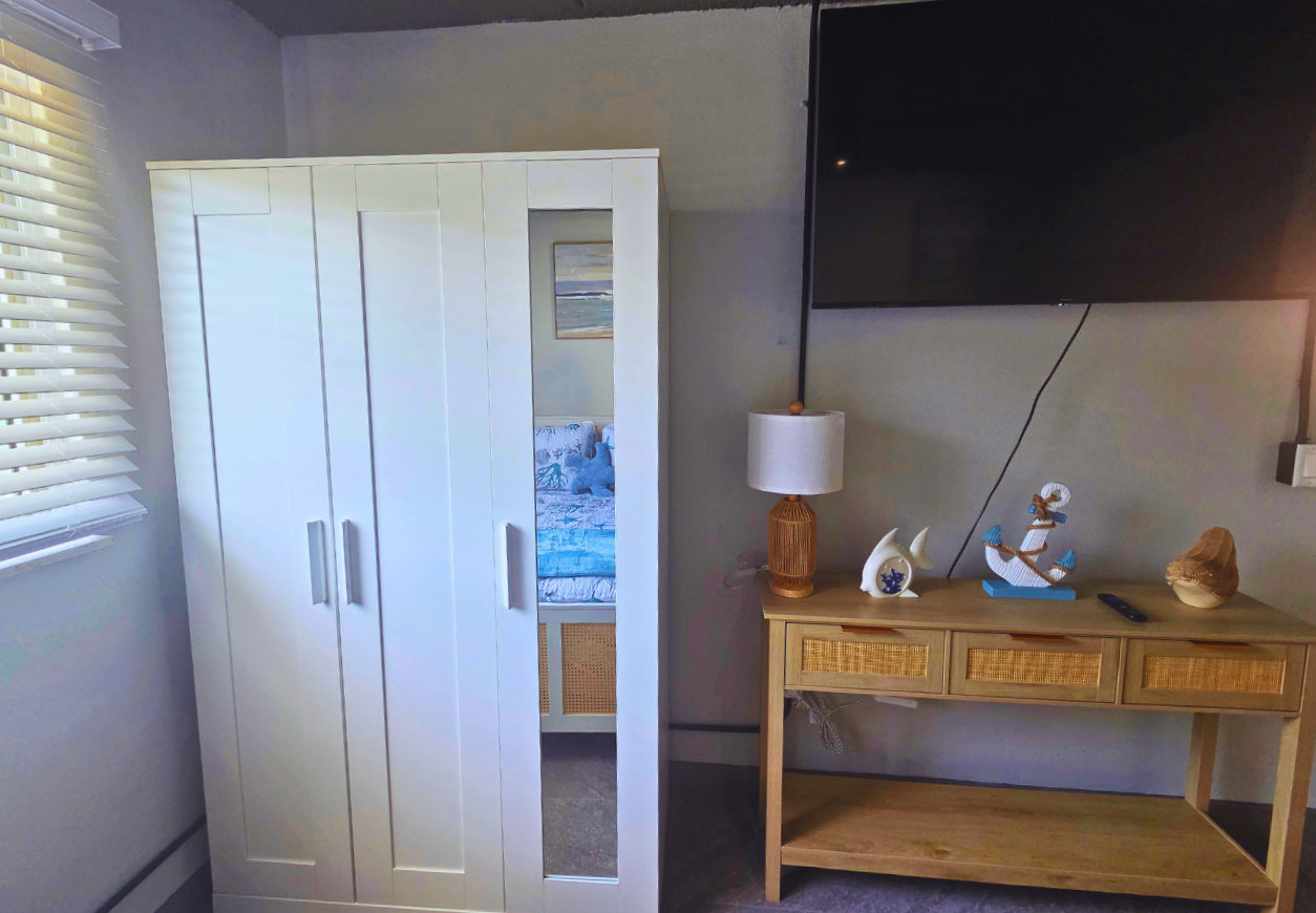 Smart TV with Netflix included and a spacious closet for added comfort. Treasure Island, FL