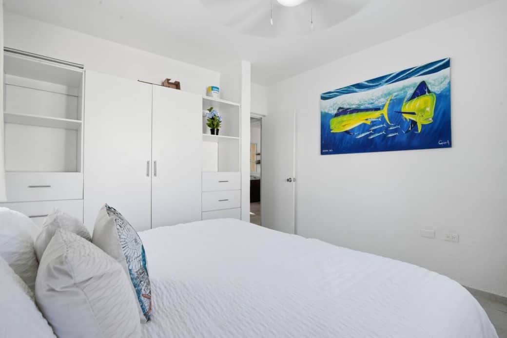 This bedroom not only features a king-size bed, but also offers a full wardrobe so you can unpack and feel right at home.