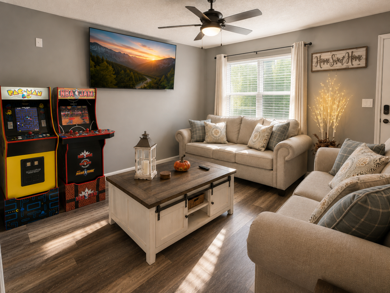 HUGE smart TV, 2 arcade cabinets with a ton of games, a pull-out sofa, and plenty of room for family