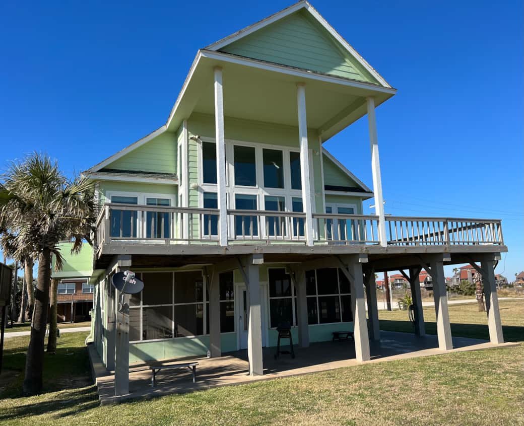 The home has a large deck facing the beach. The home has a large deck facing the beach.