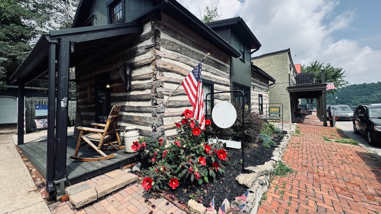 Historic log cabin exterior in downtown Augusta, Kentucky