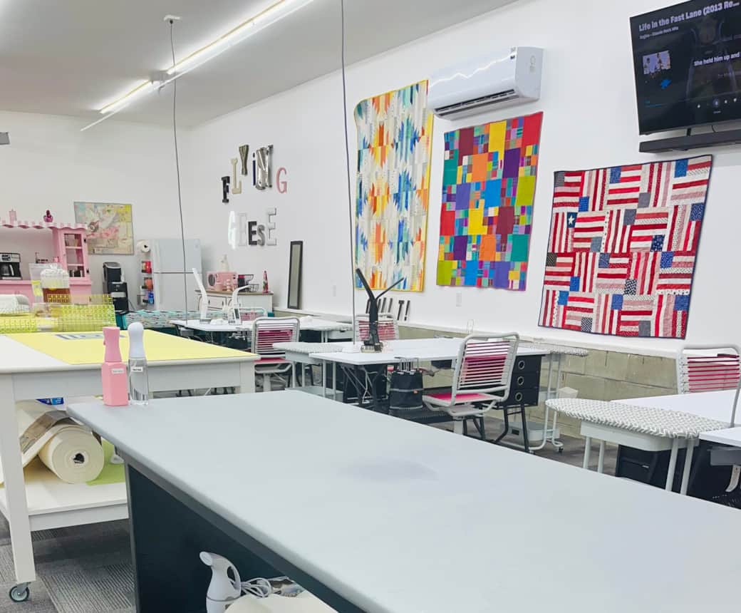 Sewing studio ironing and cutting stations