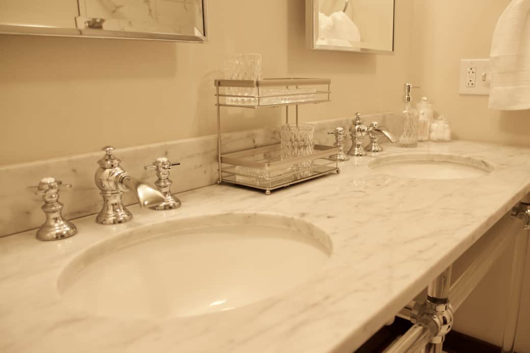 Bathroom: Dual-basin Marble Sinks