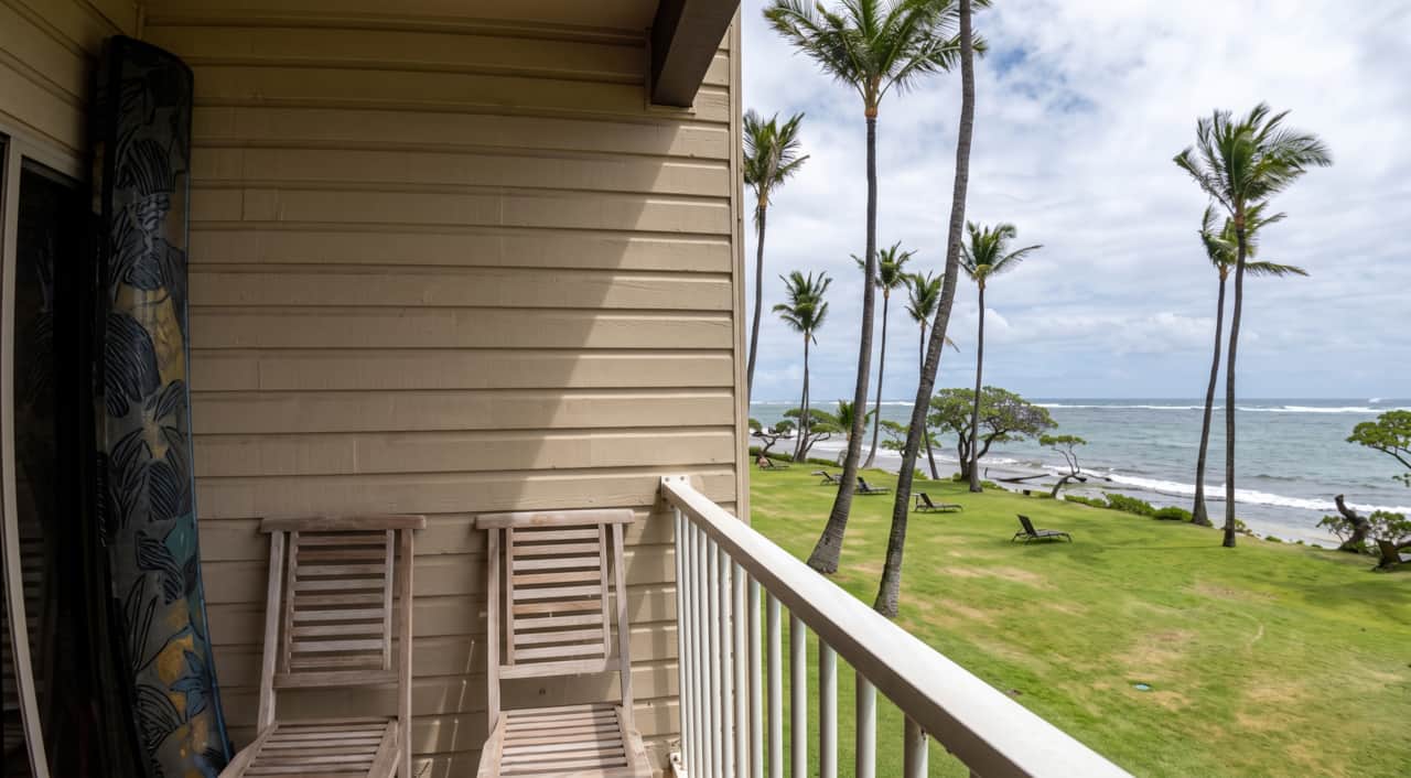 Enjoy sweeping ocean and palm-tree views from the private lanai.