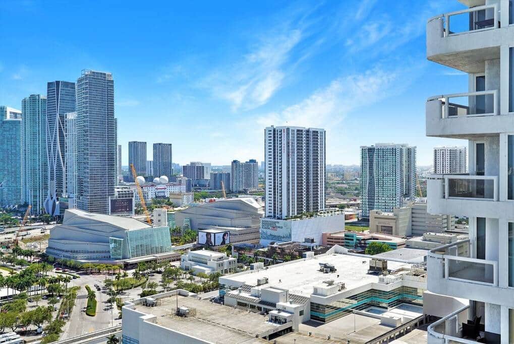 Fully furnished balcony with views of Biscayne Bay, downtown Miami and Venetian Marina
