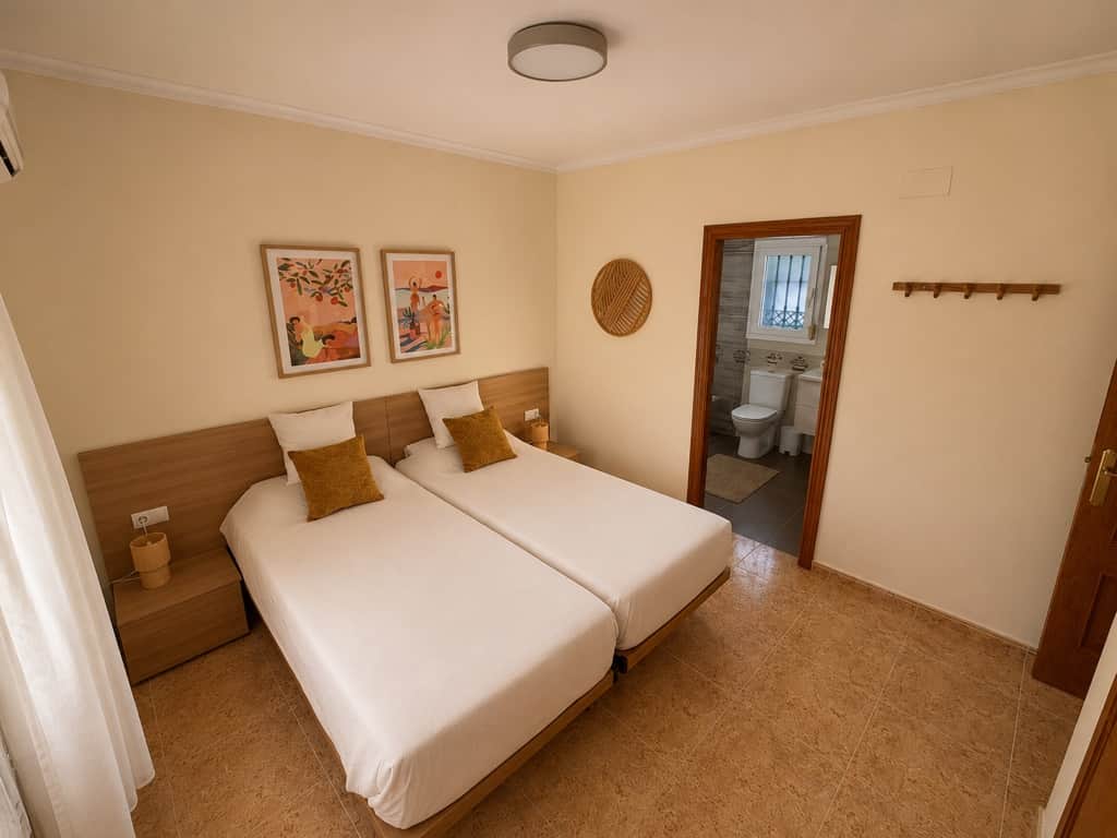 Dormitorio 1 con baño privado