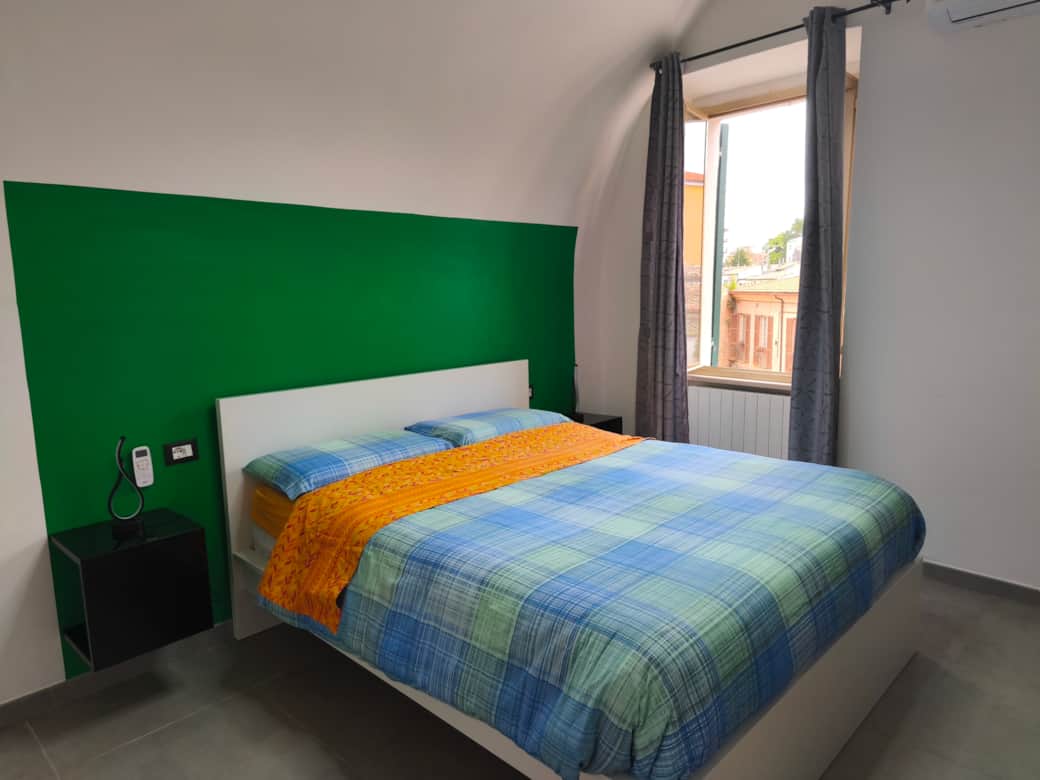 Camera da letto con condizionatore d'aria presso Agli Archi Eco House