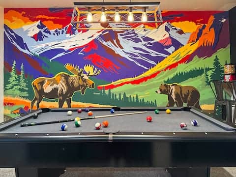 You'll have plenty of options for hanging out together, like the downstairs game room. You'll have plenty of options for hanging out together, like the downstairs game room.