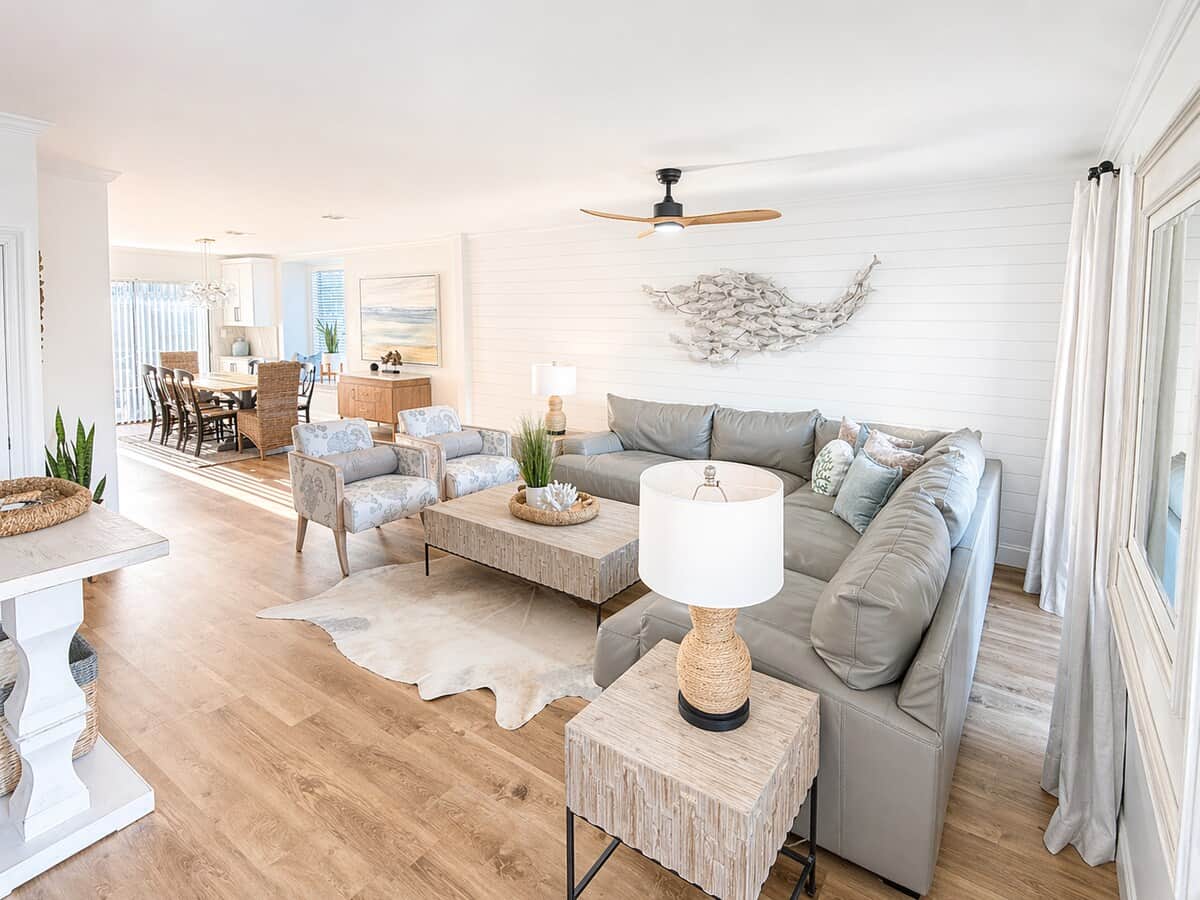 Completely remodeled with high-end finishes and designer furnishings to create an elevated coastal retreat—just steps from the beach.