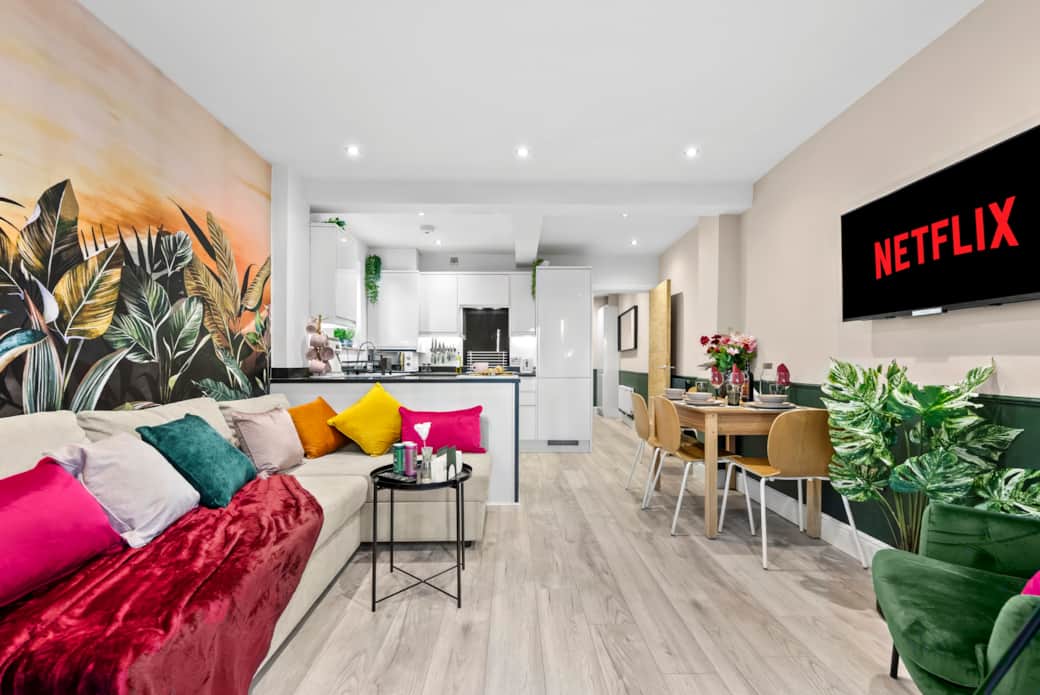 Living room with open plan kitchen and dining area