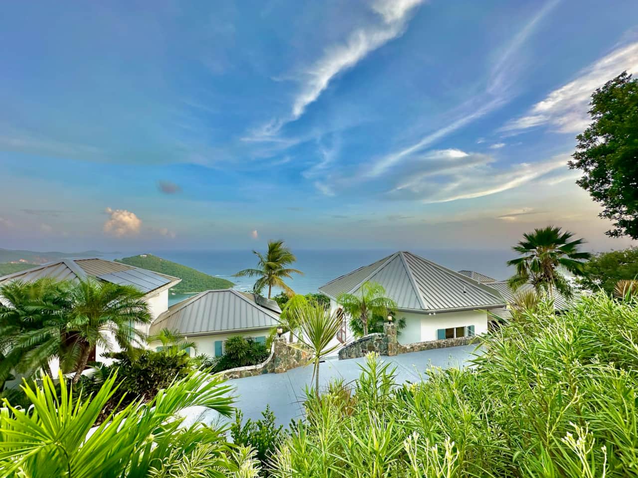 A view looking out over the villa form the street