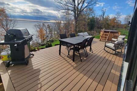 deck with cedar hot tub and bbq