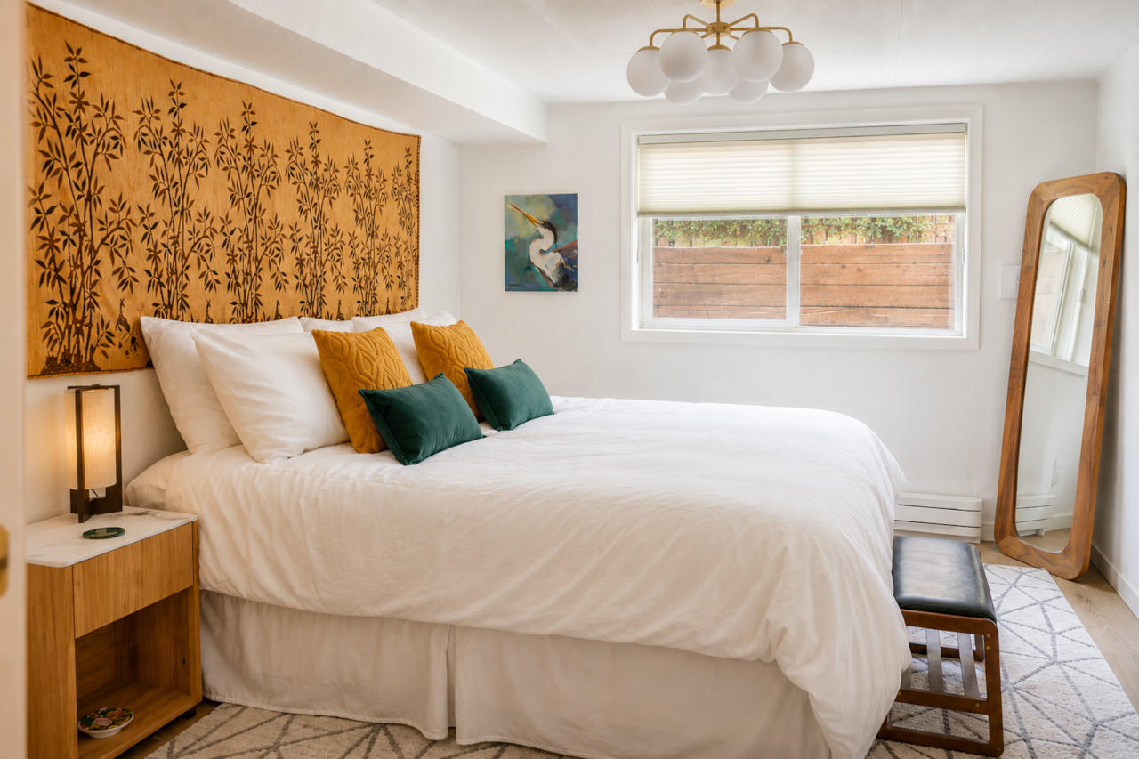 King bed with soft cotton linens for a restful night's sleep