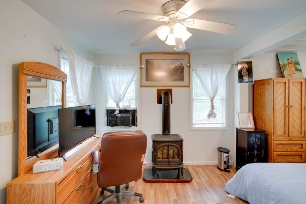 Bedroom w/ gas fireplace